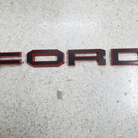 FORD RANGER 

GRILL LETTERS

   'F-O-R-D'

RED/BLACK  LETTERS