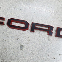 FORD RANGER 

GRILL LETTERS

   'F-O-R-D'

RED/BLACK  LETTERS