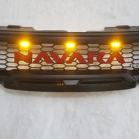 NISSAN NAVARA D40 FACELIFT COMPLETE GRILL RED LOGO/AMBER LEDS