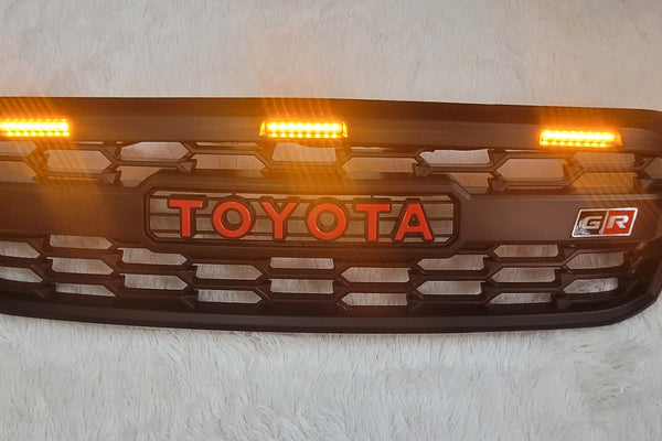 TOYOTA HILUX FULL GRILL 2005-2011 MK7 RED LOGO AMBER LED'S
