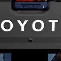 TOYOTA HILUX 2026 TAILGATE LOGO ABS MATT BLACK/GLOSS BLACK/WHITE/RED
