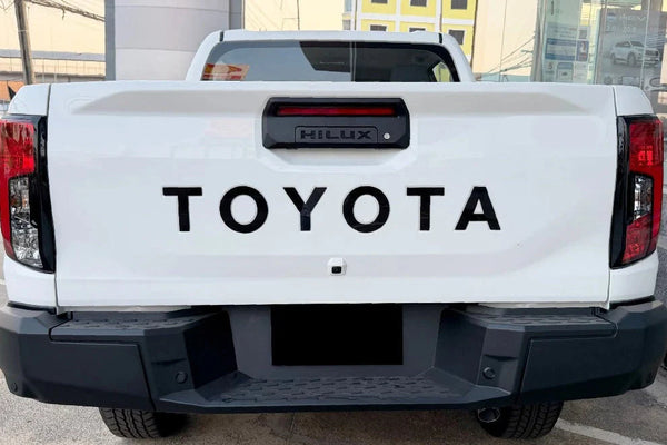 TOYOTA HILUX 2026 TAILGATE LOGO ABS MATT BLACK/GLOSS BLACK/WHITE/RED